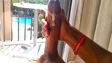 Exhibitionist makes his Huge Cock Cum in Front of the Hotel Window for all to see
